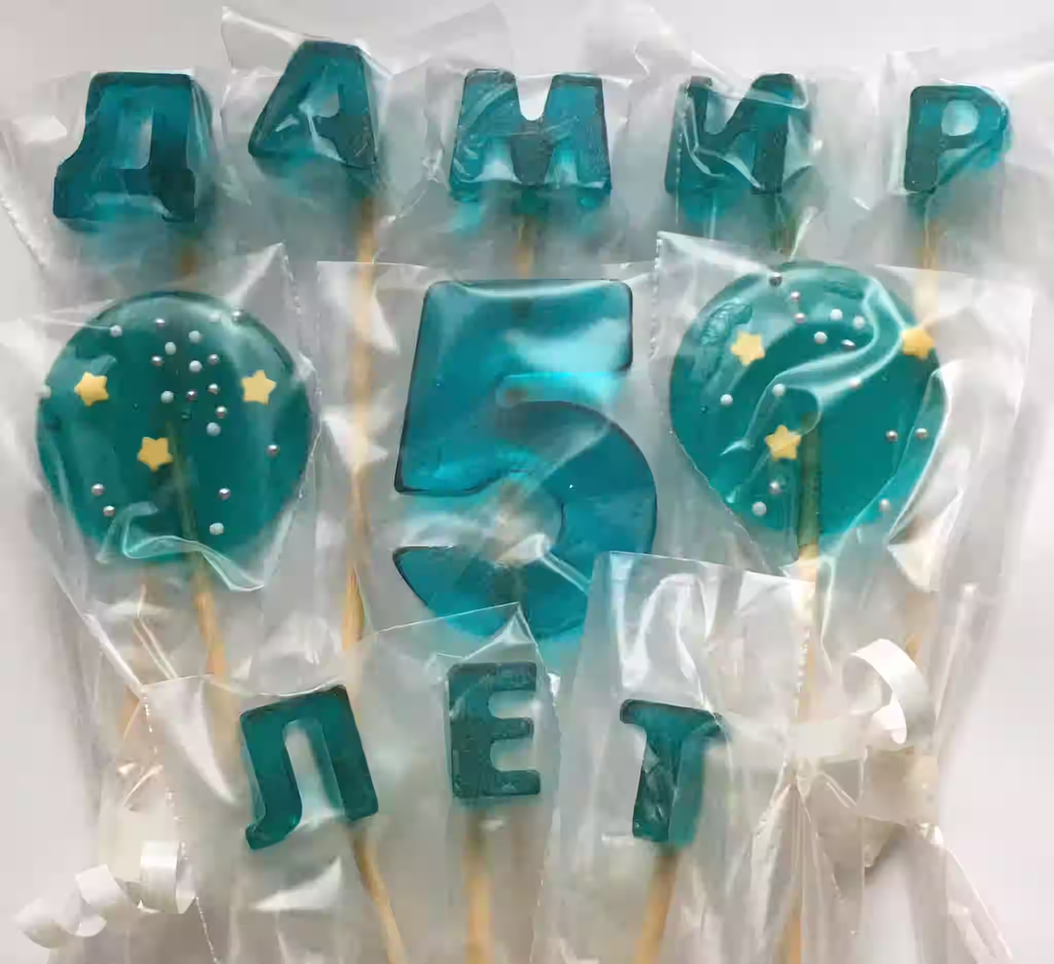 Леденец в форме буквы